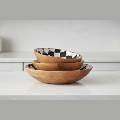 Michelle’s Nesting Bowls: decorative wood bowls set, stylish black and white design, ideal for serving and display.